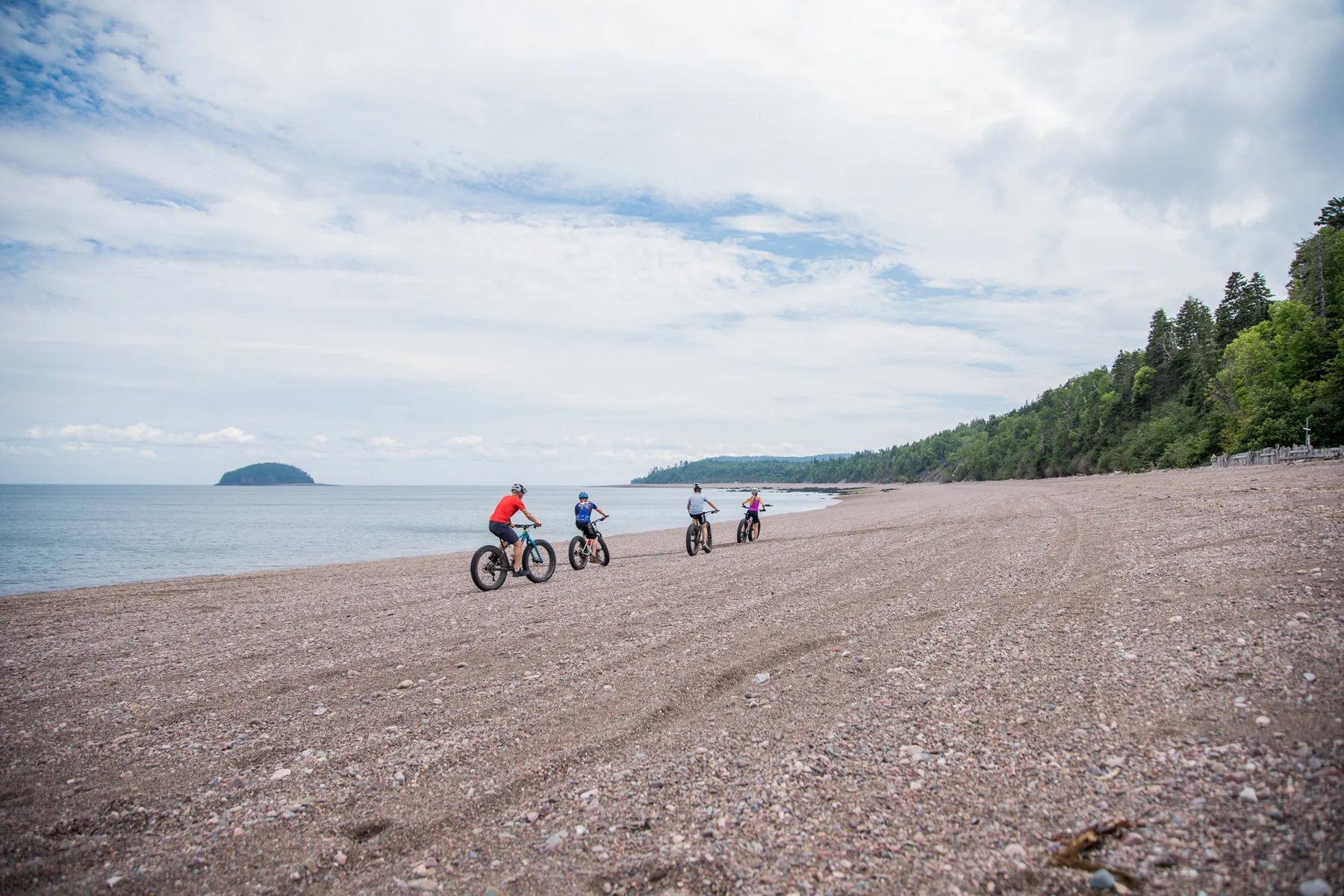A fat bike on the rippled sand of the exposed Bay of Fundy sea floor